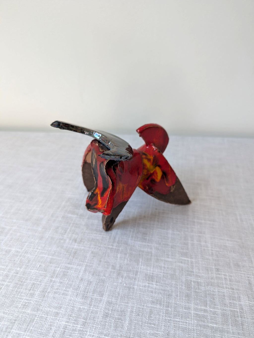 Luis del Castillo red glazed ceramic bull sculpture, view 2