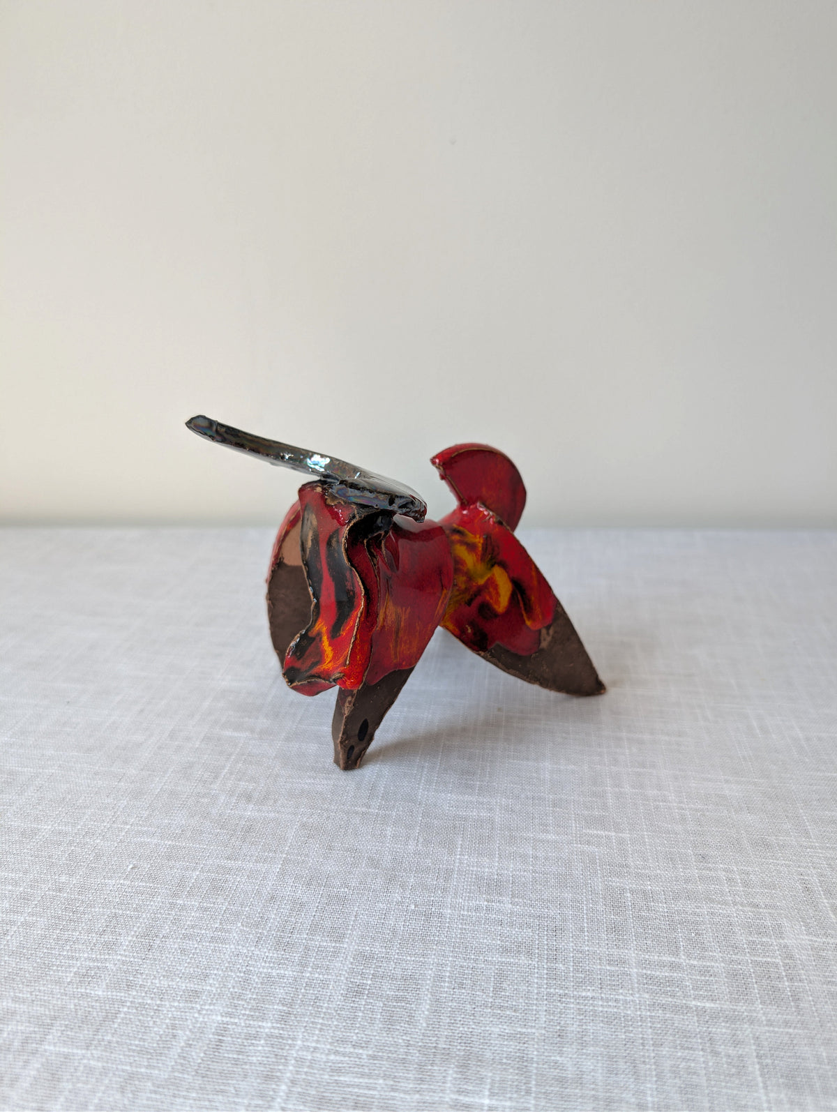 Luis del Castillo red glazed ceramic bull sculpture, view 3