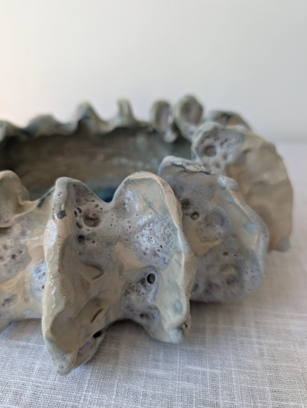 Sculptural Ceramic Bowl with Organic Rim and Blue Glaze, photograph 2