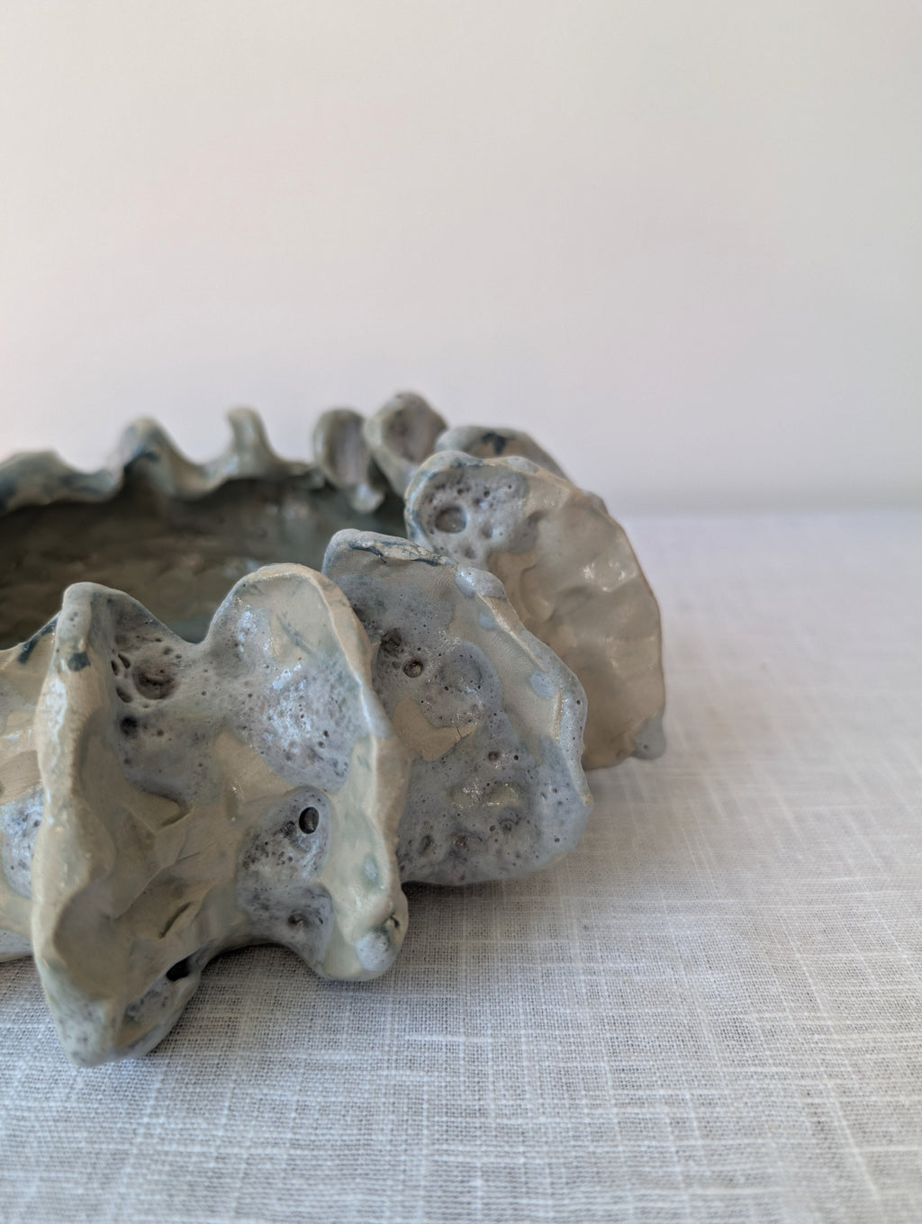 Sculptural Ceramic Bowl with Organic Rim and Blue Glaze, photograph 5