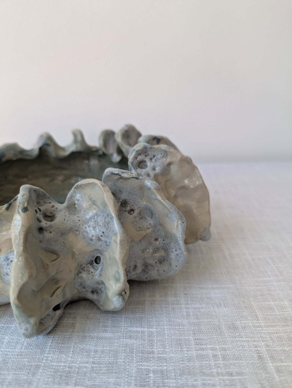 Sculptural Ceramic Bowl with Organic Rim and Blue Glaze, photograph 5