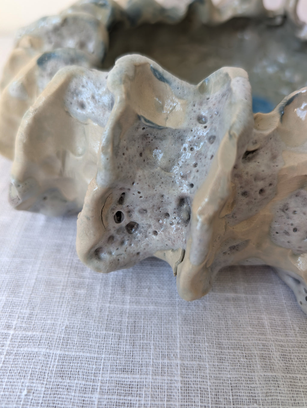 Sculptural Ceramic Bowl with Organic Rim and Blue Glaze, photograph 6