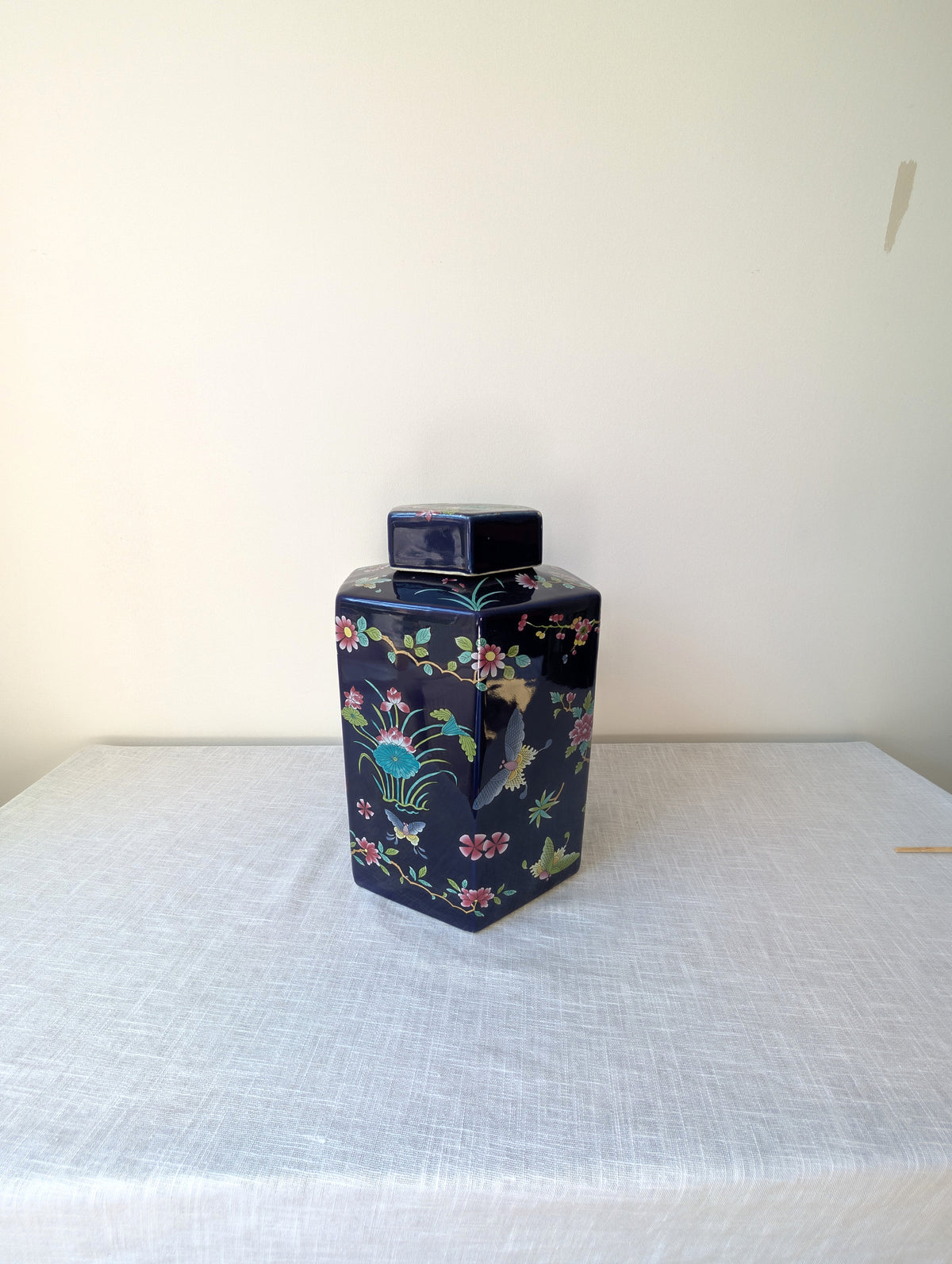 Faceted Cobalt-Blue Lidded Ceramic Jar with Floral Decoration, photograph 2