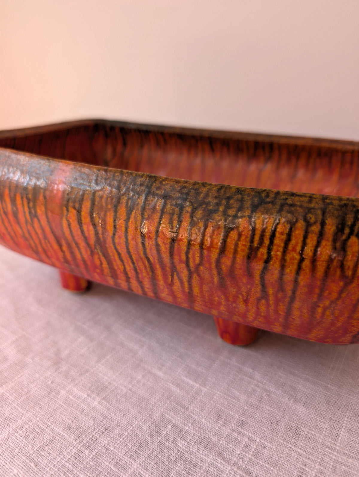 Orange-Red Footed Ceramic Tray with Black Drip Glaze, photograph 3